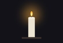 Córka dziękuje za godne pożegnanie Taty Zapalona świeca na ciemnym tle